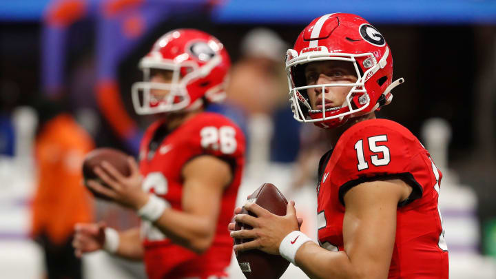 Georgia quarterback Carson Beck (15) warms up before the start of the NCAA Aflac Kickoff Game in Atlanta, on Saturday, Aug. 31, 2024.