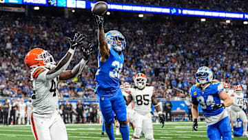 Detroit Lions safety Brian Branch (32) breaks a pass intended for Cleveland Browns tight end Harold Fannin Jr. (44) during the second half at Ford Field in Detroit on Sunday, Sept. 28, 2025.