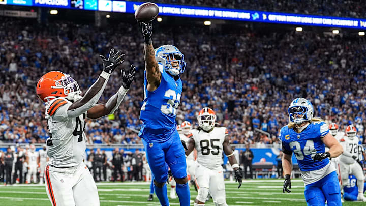 Detroit Lions safety Brian Branch (32) breaks a pass intended for Cleveland Browns tight end Harold Fannin Jr. (44) during the second half at Ford Field in Detroit on Sunday, Sept. 28, 2025.
