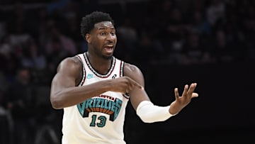 Apr 8, 2025; Charlotte, North Carolina, USA;  Memphis Grizzlies center Jaren Jackson Jr. (13) reacts after scoring during the first half against the Charlotte Hornets at the Spectrum Center. Mandatory Credit: Sam Sharpe-Imagn Images