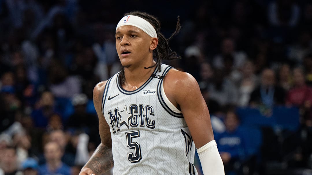 Orlando Magic forward Paolo Banchero (5) dribbles the ball against the Dallas Mavericks in the third quarter at Kia Center. 
