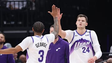 Oct 29, 2025; Salt Lake City, Utah, USA; Utah Jazz guard Keyonte George (3) and center Walker Kessler (24) react to a play against the Portland Trail Blazers during the first quarter at Delta Center. Mandatory Credit: Rob Gray-Imagn Images