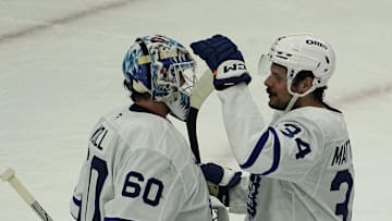 Feb 23, 2025; Chicago, Illinois, USA; Toronto Maple Leafs goaltender Joseph Woll (60) and center Auston Matthews (34) celebrate their win against the Chicago Blackhawks at United Center. Mandatory Credit: David Banks-Imagn Images