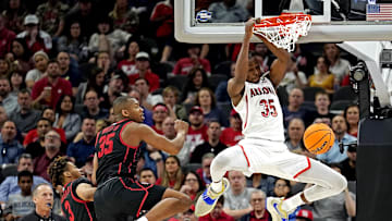 Mar 24, 2022; San Antonio, TX, USA; Arizona Wildcats center Christian Koloko (35) dunk the ball again Houston Cougars forward Fabian White Jr. (35) during the second half in the semifinals of the South regional of the men's college basketball NCAA Tournament at AT&T Center. Mandatory Credit: Scott Wachter-Imagn Images