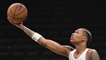 Oct 9, 2025; Milwaukee, Wisconsin, USA; Milwaukee Bucks forward Tyler Smith (21) warms up before game against the Detroit Pistons at Fiserv Forum. Mandatory Credit: Benny Sieu-Imagn Images