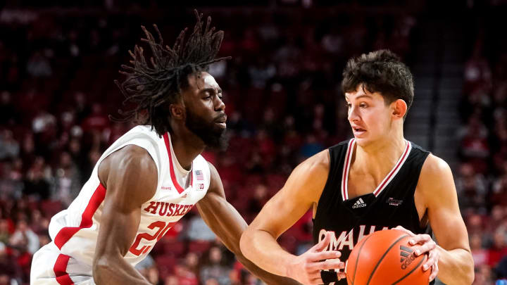 Nov 10, 2022; Lincoln, Nebraska, USA; Nebraska-Omaha Mavericks forward Frankie Fidler (23) drives against Nebraska Cornhuskers guard Emmanuel Bandoumel (25) during the second half at Pinnacle Bank Arena. Mandatory Credit: Dylan Widger-USA TODAY Sports