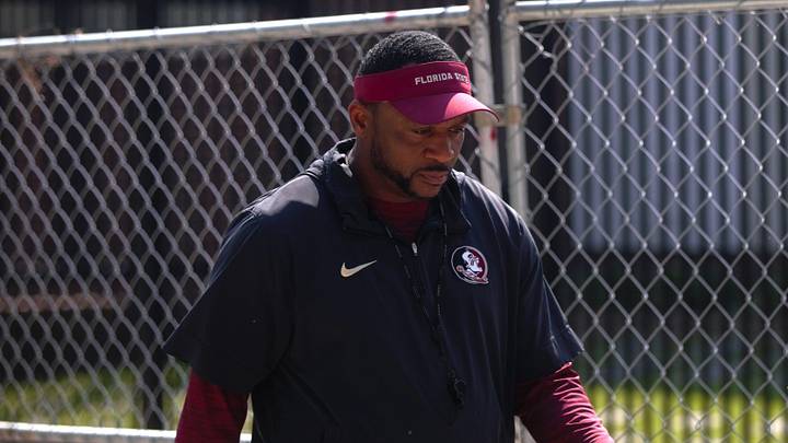 FSU football players walk into the first spring practice of the spring season on Wednesday, March 19, 2025