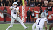Nov 2, 2024; Houston, Texas, USA; Kansas State Wildcats quarterback Avery Johnson (2) completes a pass to wide receiver Jayce Brown (1) against the Houston Cougars in the second quarter at TDECU Stadium. Mandatory Credit: Thomas B. Shea-Imagn Images