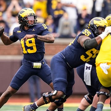 Bryce Underwood earned Michigan's starting job as a true freshman, head coach Sherrone Moore announced on Monday. 
