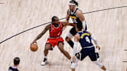 Apr 21, 2025; Denver, Colorado, USA; Los Angeles Clippers forward Kawhi Leonard (2) controls the ball as Denver Nuggets forward Aaron Gordon (32) and guard Russell Westbrook (4) guards in the fourth quarter during game two of first round for the 2025 NBA Playoffs at Ball Arena. Mandatory Credit: Isaiah J. Downing-Imagn Images