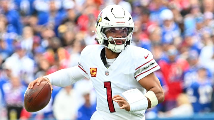 Sep 8, 2024; Orchard Park, New York, USA; Arizona Cardinals quarterback Kyler Murray (1) runs out of the pocket against the Buffalo Bills in the first quarter at Highmark Stadium. Mandatory Credit: Mark Konezny-Imagn Images