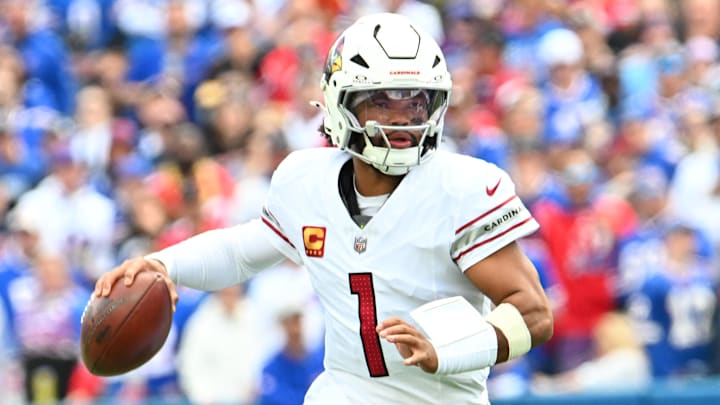 Sep 8, 2024; Orchard Park, New York, USA; Arizona Cardinals quarterback Kyler Murray (1) runs out of the pocket against the Buffalo Bills in the first quarter at Highmark Stadium. Mandatory Credit: Mark Konezny-Imagn Images