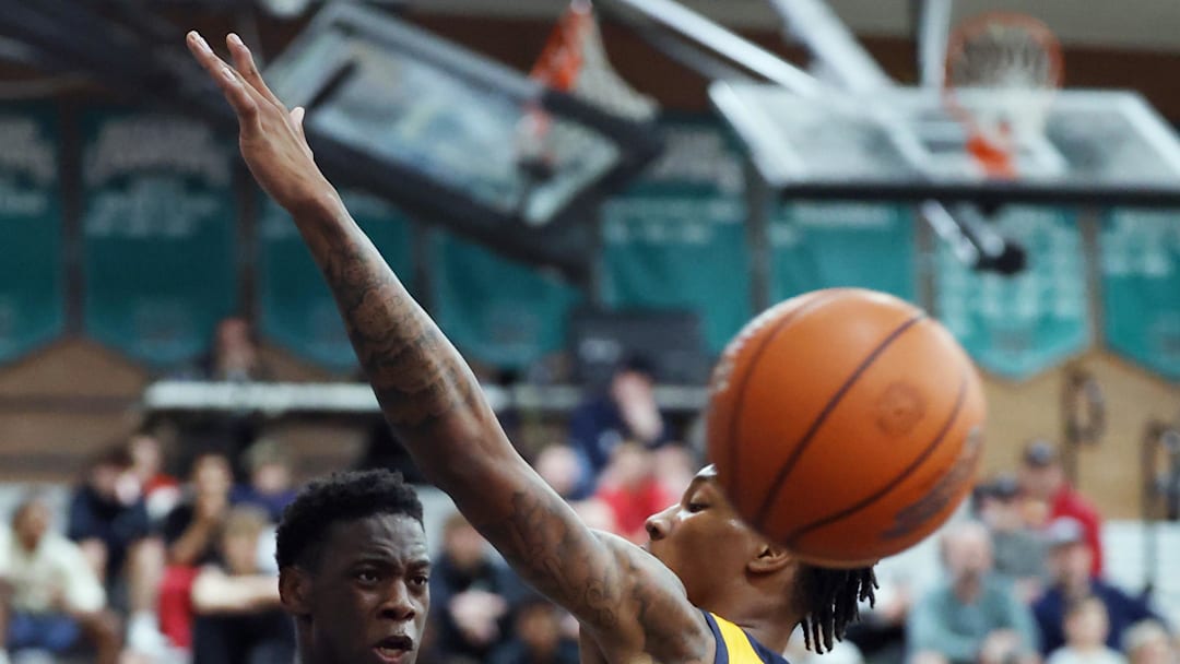 Jan 4, 2025; Gilbert, AZ, USA; Utah Prep Academy forward AJ Dybantsa (3) passes the ball against Faith Family Academy (TX) forward Davion Adkins (25) during the Hoophall West High School Invitational at Highland High School. Mandatory Credit: Mark J. Rebilas-Imagn Images