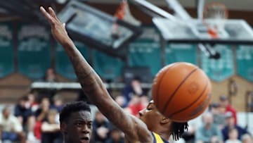 Jan 4, 2025; Gilbert, AZ, USA; Utah Prep Academy forward AJ Dybantsa (3) passes the ball against Faith Family Academy (TX) forward Davion Adkins (25) during the Hoophall West High School Invitational at Highland High School. Mandatory Credit: Mark J. Rebilas-Imagn Images