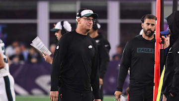 Aug 15, 2024; Foxborough, MA, USA; Philadelphia Eagles quarterbacks coach Doug Nussmeier works on the sideline during the first half against the New England Patriots at Gillette Stadium. Mandatory Credit: Eric Canha-Imagn Images