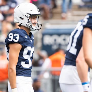 Penn State kicker Sander Sahaydak (93) participates in team warmups before the start of a game at Beaver Stadium.