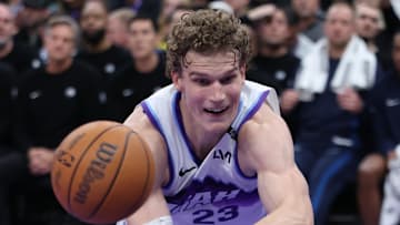 Nov 10, 2025; Salt Lake City, Utah, USA; Utah Jazz forward Lauri Markkanen (23) dives to save a ball during the second half of a game against the Minnesota Timberwolves at Delta Center. Mandatory Credit: Rob Gray-Imagn Images