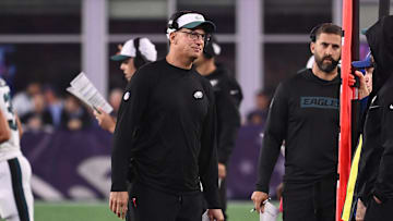 Aug 15, 2024; Foxborough, MA, USA; Philadelphia Eagles quarterbacks coach Doug Nussmeier works on the sideline during the first half against the New England Patriots at Gillette Stadium. Mandatory Credit: Eric Canha-Imagn Images