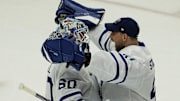 Feb 23, 2025; Chicago, Illinois, USA; Toronto Maple Leafs goaltender Joseph Woll (60) and goaltender Anthony Stolarz (41) celebrate their win against the Chicago Blackhawks at United Center. Mandatory Credit: David Banks-Imagn Images