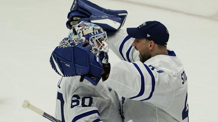 Feb 23, 2025; Chicago, Illinois, USA; Toronto Maple Leafs goaltender Joseph Woll (60) and goaltender Anthony Stolarz (41) celebrate their win against the Chicago Blackhawks at United Center. Mandatory Credit: David Banks-Imagn Images