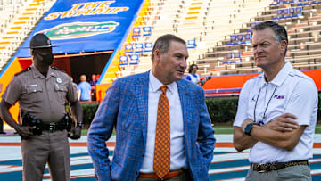 Florida Gators head coach Dan Mullen talks with UF Athletic Director Scott Stricklin, right, after Gator Walks. Fans tailgate before the start of the season opener of the Florida Gators vs the Florida Atlantic Owls Saturday afternoon, September 4, 2021 in Gainesville, FL. Gators perform the Gator Walk after a year hiatus because of COVID-19.  [Doug Engle/Ocala Star Banner]2021

Flgai Ufvsfau 090421