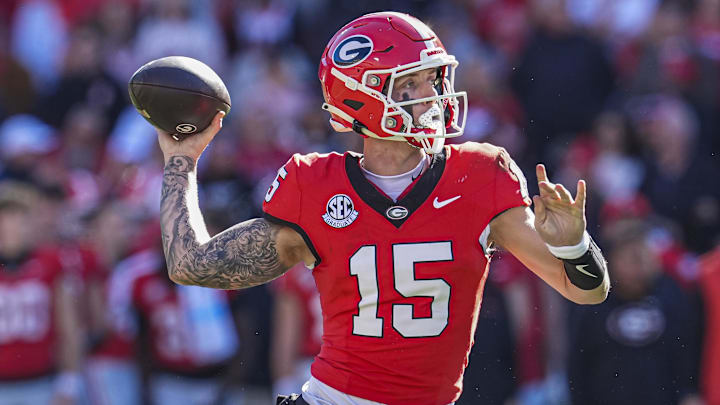 Nov 23, 2024; Athens, Georgia, USA; Georgia Bulldogs quarterback Carson Beck (15) passes the ball against the Massachusetts Minutemen during the first half at Sanford Stadium. Mandatory Credit: Dale Zanine-Imagn Images
