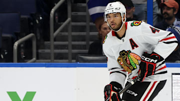 Jan 28, 2025; Tampa, Florida, USA; Chicago Blackhawks defenseman Seth Jones (4) skates with the puck against the Tampa Bay Lightning during the second period at Amalie Arena. Mandatory Credit: Kim Klement Neitzel-Imagn Images
