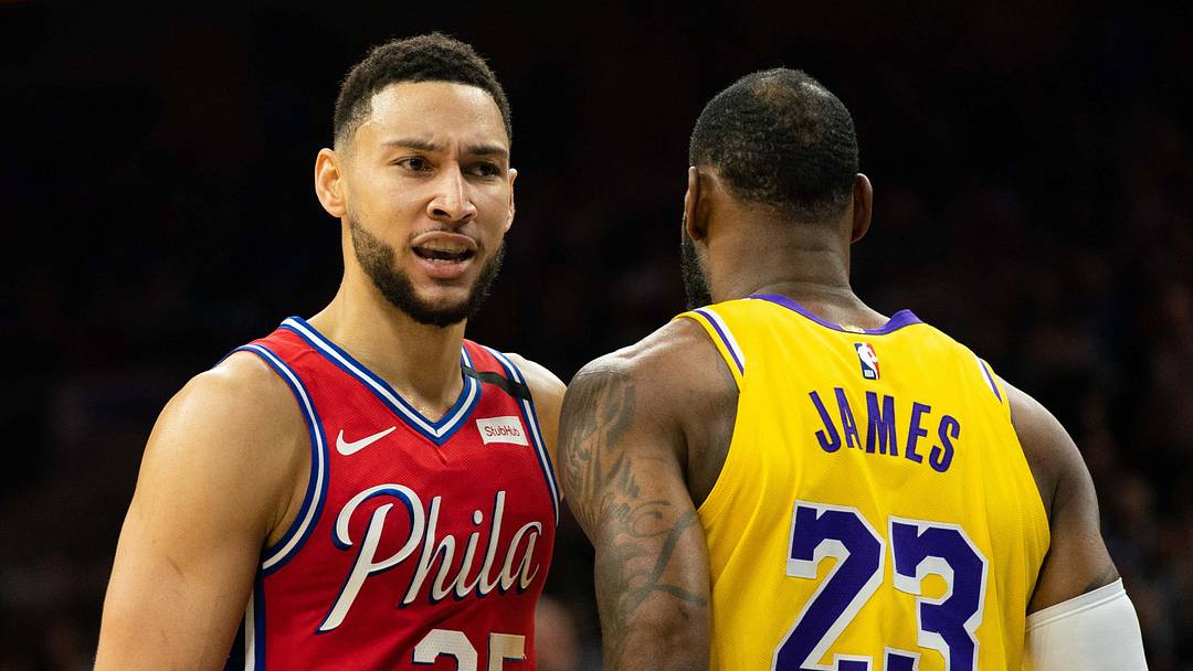 Jan 25, 2020; Philadelphia, Pennsylvania, USA; Philadelphia 76ers guard Ben Simmons (25) walks past Los Angeles Lakers forward LeBron James (23) during a game at Wells Fargo Center. Mandatory Credit: Bill Streicher-USA TODAY Sports Jan 25, 2020; Philadelphia, Pennsylvania, USA; Philadelphia 76ers guard Ben Simmons (25) walks past Los Angeles Lakers forward LeBron James (23) during a game at Wells Fargo Center. Mandatory Credit: Bill Streicher-USA TODAY Sports