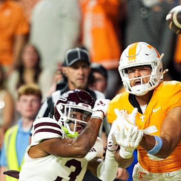 Tennessee Volunteers wide receiver Bru McCoy (5) cannot make a the catch against Mississippi State Bulldogs safety Brylan Lanier (3) during the second half at Neyland Stadium.