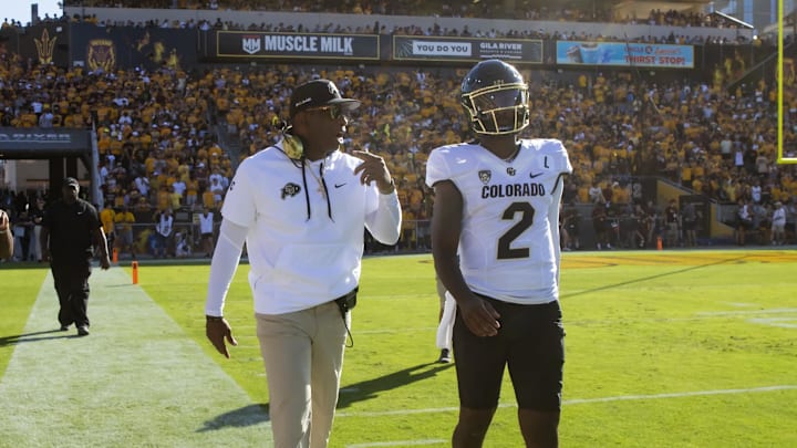 Buffaloes coach Deion Sanders is still mulling over whether he will fly to Las Vegas to watch his son Shedeur's first NFL start on Sunday.