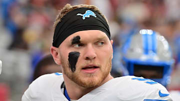 Sep 22, 2024; Glendale, Arizona, USA; Detroit Lions defensive end Aidan Hutchinson (97) looks on prior to the game against the Arizona Cardinals at State Farm Stadium. Mandatory Credit: Matt Kartozian-Imagn Images
