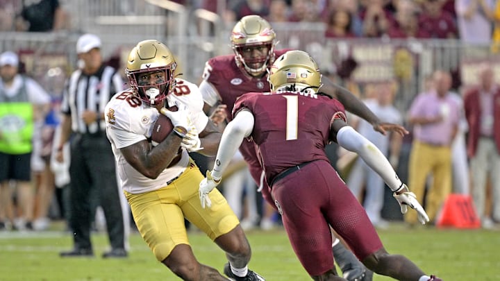 Sep 2, 2024; Tallahassee, Florida, USA; Boston College Eagles tight end Kamari Morales (88) runs the ball against Florida State Seminoles defensive back Shyheim Brown (1) during the first quarter at Doak S. Campbell Stadium. Mandatory Credit: Melina Myers-Imagn Images