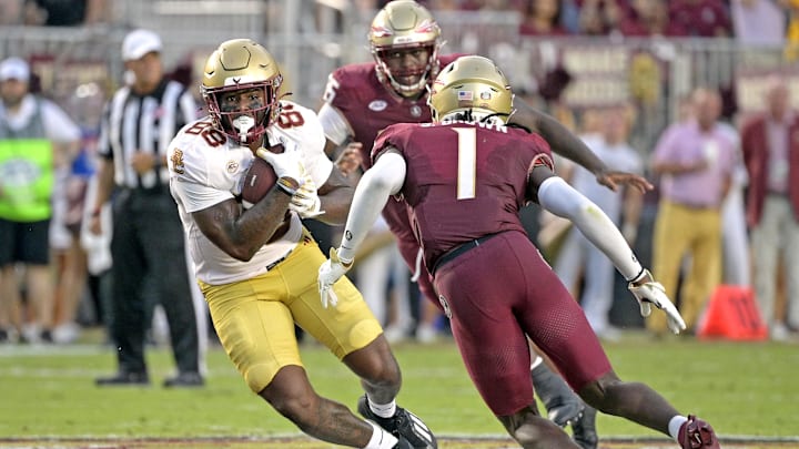 Sep 2, 2024; Tallahassee, Florida, USA; Boston College Eagles tight end Kamari Morales (88) runs the ball against Florida State Seminoles defensive back Shyheim Brown (1) during the first quarter at Doak S. Campbell Stadium. Mandatory Credit: Melina Myers-Imagn Images