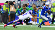 Nov 30, 2025; Seattle, Washington, USA; Seattle Seahawks wide receiver Jaxon Smith-Njigba (11) runs the ball after a catch during the second half against the Minnesota Vikings at Lumen Field. Mandatory Credit: Steven Bisig-Imagn Images