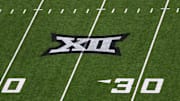 Sep 6, 2025; Lubbock, Texas, USA;  A general view of the Big 12 logo on the field during the game between the Kent State Golden Flashes and the Texas Tech Red Raiders at Jones AT&T Stadium. Mandatory Credit: Michael C. Johnson-Imagn Images