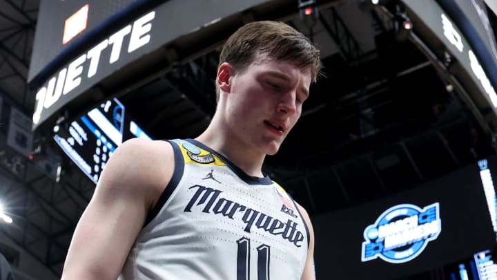 Mar 29, 2024; Dallas, TX, USA; Marquette Golden Eagles guard Tyler Kolek (11) leaves the court after losing to the North Carolina State Wolfpack in the semifinals of the South Regional of the 2024 NCAA Tournament at American Airlines Center. Mandatory Credit: Kevin Jairaj-USA TODAY Sports 