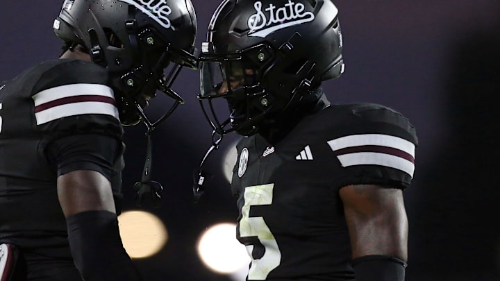 Sep 6, 2025; Starkville, Mississippi, USA; Mississippi State Bulldogs defensive back Kelley Jones (1) and defensive back Stonka Burnside (5) react during the second quarter against the Arizona State Sun Devils at Davis Wade Stadium at Scott Field. Mandatory Credit: Petre Thomas-Imagn Images
