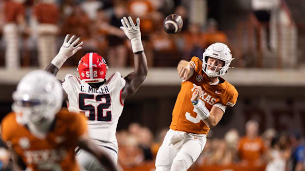 Texas quarterback Quinn Ewers throws the ball against Georgia  during their first meeting in October. 