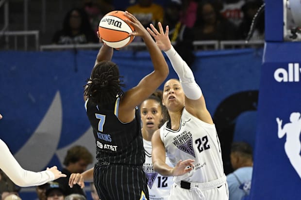 Golden State Valkyries guard Veronica Burton defends against Chicago Sky guard Ariel Atkins. 