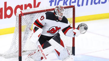 New Jersey Devils goaltender Akira Schmid (40) warms up before the game.