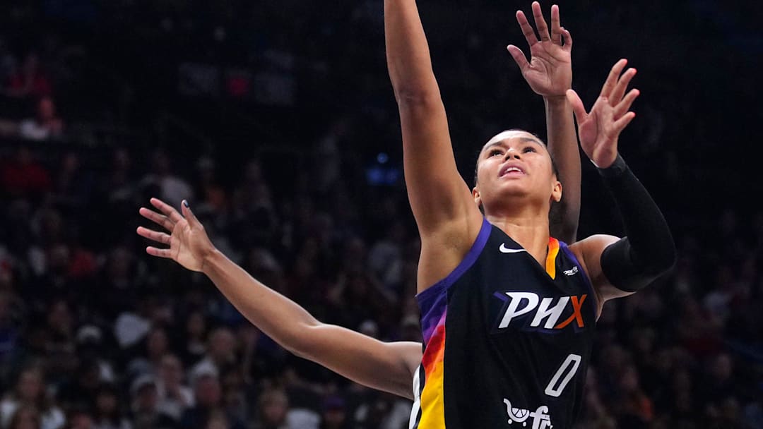 Mercury forward Satou Sabally (0) makes a layup against the Aces during a game at PHX Arena in Phoenix, on Aug. 15, 2025. Mercury forward Satou Sabally (0) makes a layup against the Aces during a game at PHX Arena in Phoenix, on Aug. 15, 2025.