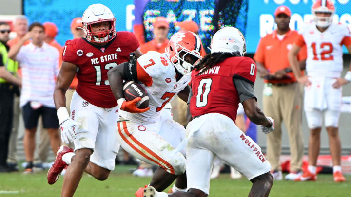 Oct 28, 2023; Raleigh, North Carolina, USA; Clemson Tigers running back Phil Mafah (7) runs the ball during the second half against the North Carolina State Wolfpack at Carter-Finley Stadium.