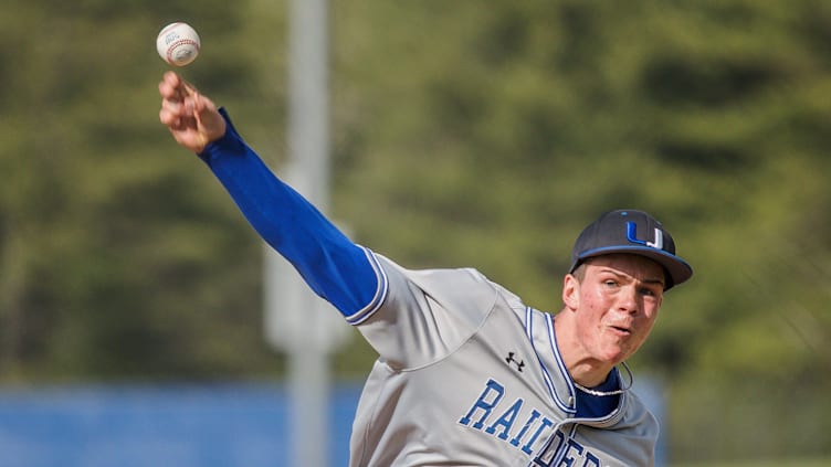 U-32 senior Owen Kellington fires a pitch vs. Lamoille in East Montpelier on Tuesday, May 18,