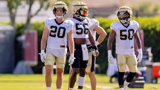 New Orleans Saints linebackers Pete Werner (20) and  linebacker Demario Davis (56) during a training camp practice  