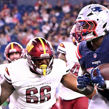 Aug 8, 2025; Foxborough, Massachusetts, USA; New England Patriots running back Terrell Jennings (26) scores a touchdown against the Washington Commanders during the second half at Gillette Stadium. Mandatory Credit: Brian Fluharty-Imagn Images