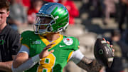 Oregon quarterback Dillon Gabriel throws out a pass during warmups as the Oregon Ducks face the Ohio State Buckeyes Wednesday, Jan. 1, 2025, in the quarterfinal of the College Football Playoff at the Rose Bowl in Pasadena, Calif.