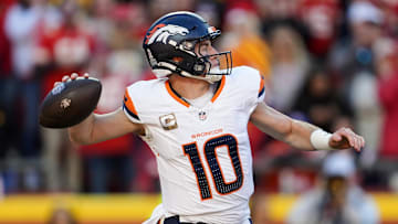 Nov 10, 2024; Kansas City, Missouri, USA; Denver Broncos quarterback Bo Nix (10) throws a pass during the second half against the Kansas City Chiefs at GEHA Field at Arrowhead Stadium. Mandatory Credit: Jay Biggerstaff-Imagn Images