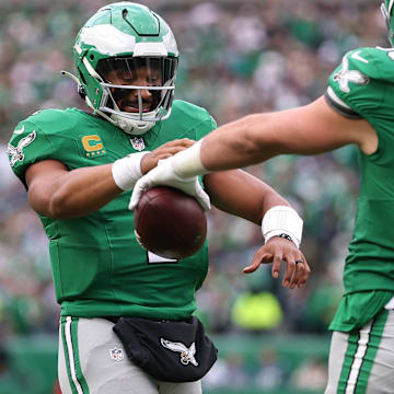 Oct 26, 2025; Philadelphia, Pennsylvania, USA; Philadelphia Eagles tight end Dallas Goedert (88) celebrates with quarterback Jalen Hurts (1) after scoring a touchdown against the New York Giants in the fourth quarter at Lincoln Financial Field. Mandatory Credit: Bill Streicher-Imagn Images