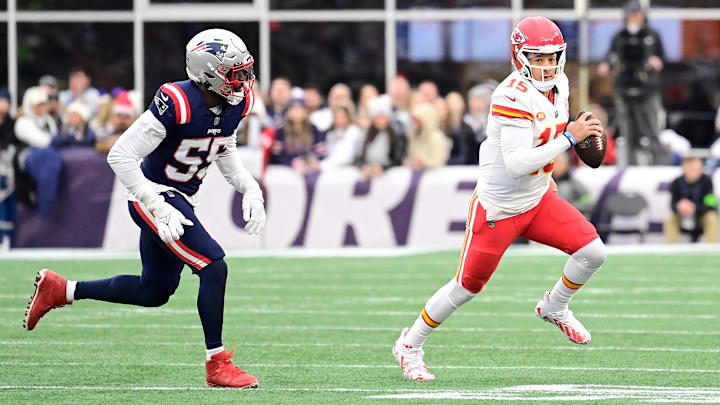 Dec 17, 2023; Foxborough, Massachusetts, USA; Kansas City Chiefs quarterback Patrick Mahomes (15) scrambles as New England Patriots linebacker Josh Uche (55) chases him during the second half at Gillette Stadium. Mandatory Credit: Eric Canha-Imagn Images Dec 17, 2023; Foxborough, Massachusetts, USA; Kansas City Chiefs quarterback Patrick Mahomes (15) scrambles as New England Patriots linebacker Josh Uche (55) chases him during the second half at Gillette Stadium. Mandatory Credit: Eric Canha-Imagn Images