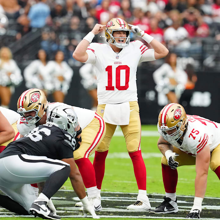 San Francisco 49ers quarterback Mac Jones calls a play against the Las Vegas Raiders 
